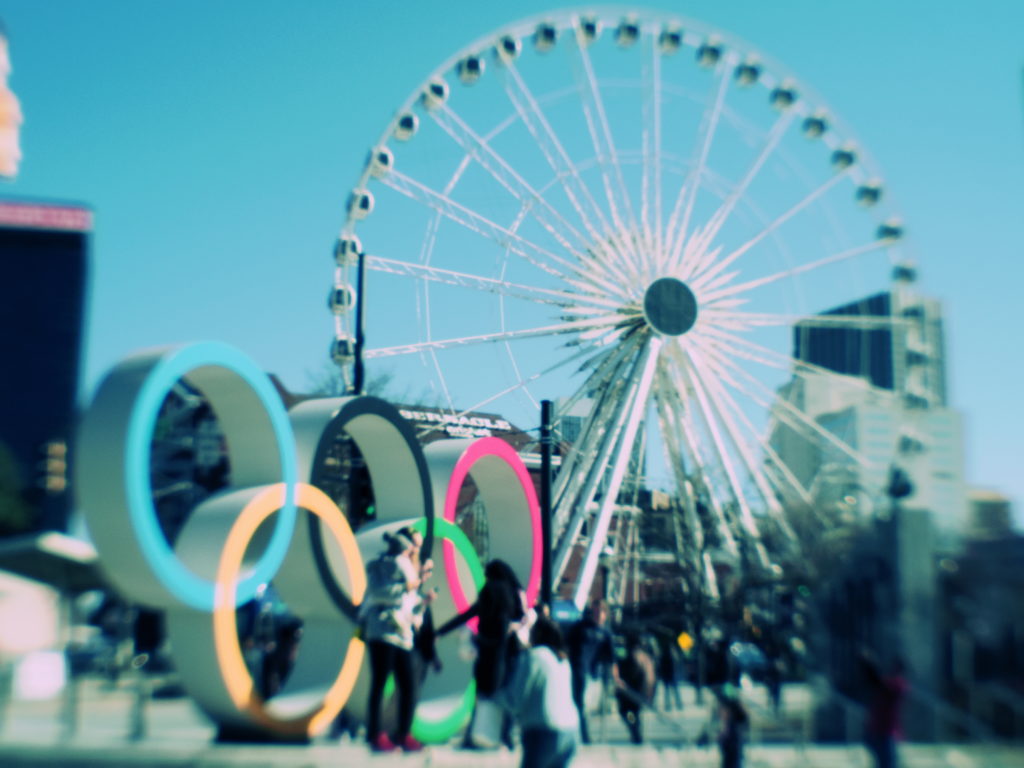 centennial olympic park atlanta georgia olympic rings and ferris wheel skyview atlanta